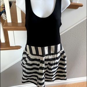 Forever 21 dress Black top with black & white stripe bottom with pockets size M